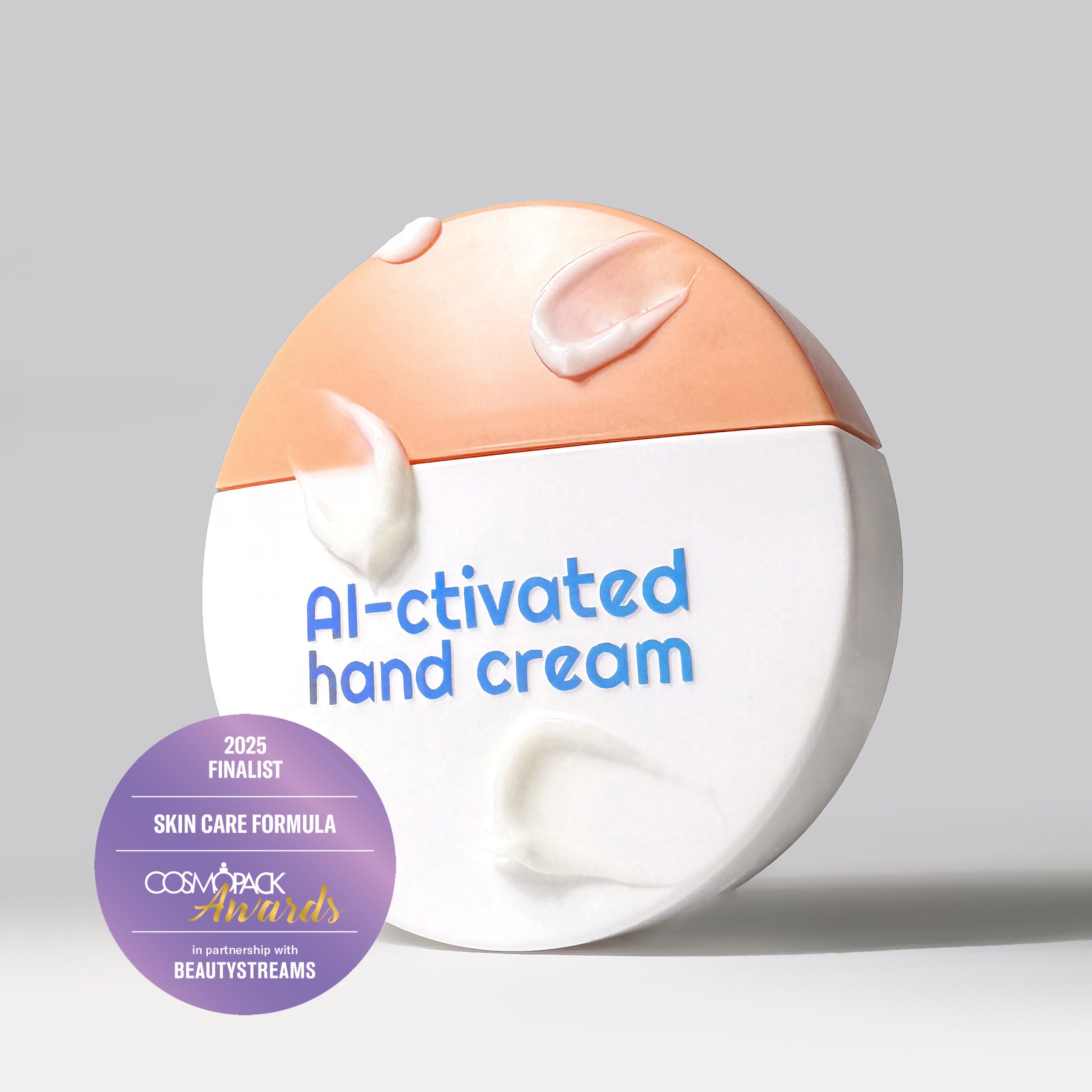 Photo of the Cosmopack Awards 2025 finalist – Blue Light AI ctivated Hand Cream  A sleek, round bottle tube on a white background, highlighting the modern design and innovative formula that protects the skin from blue light 
